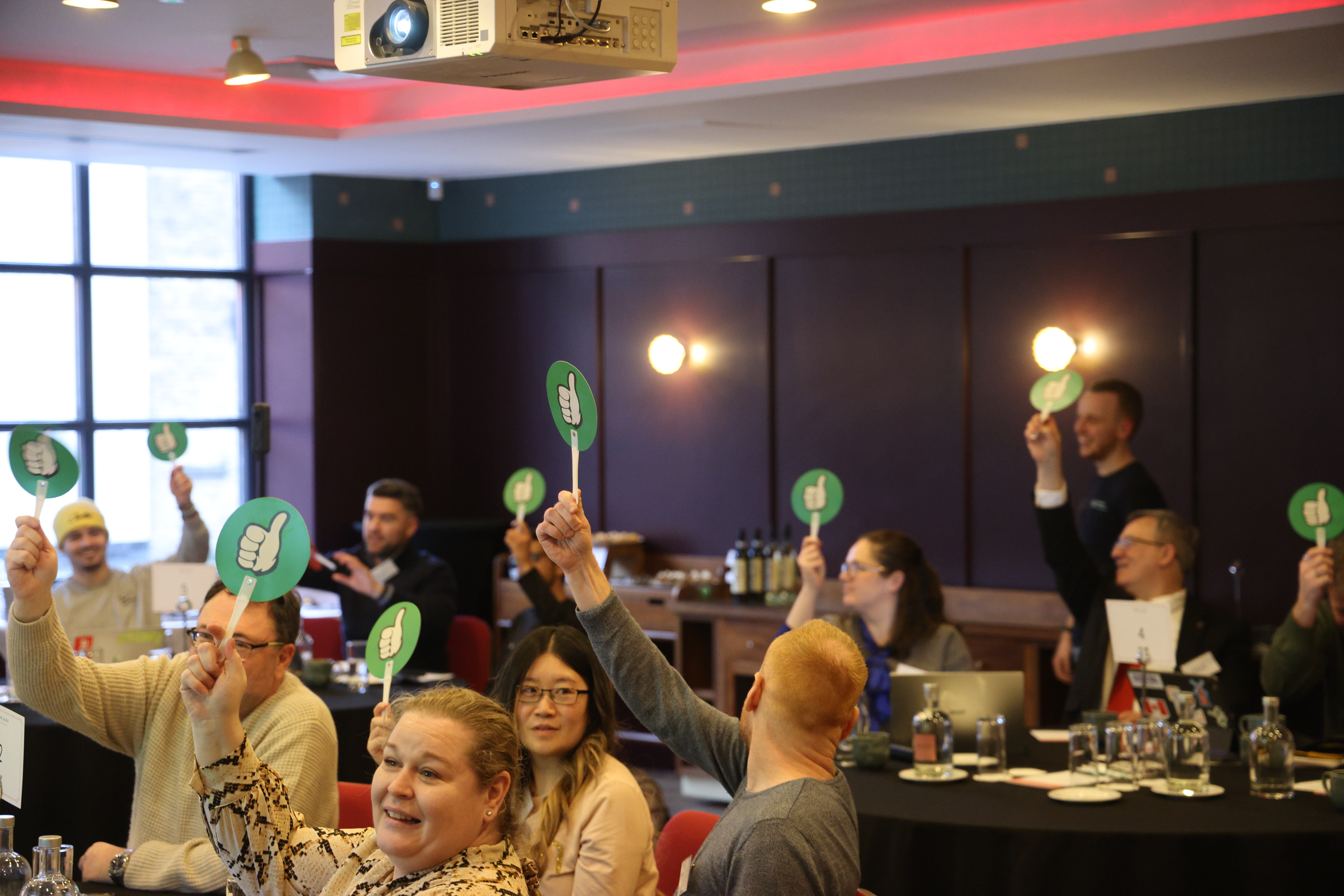 Participants voting during a simulation