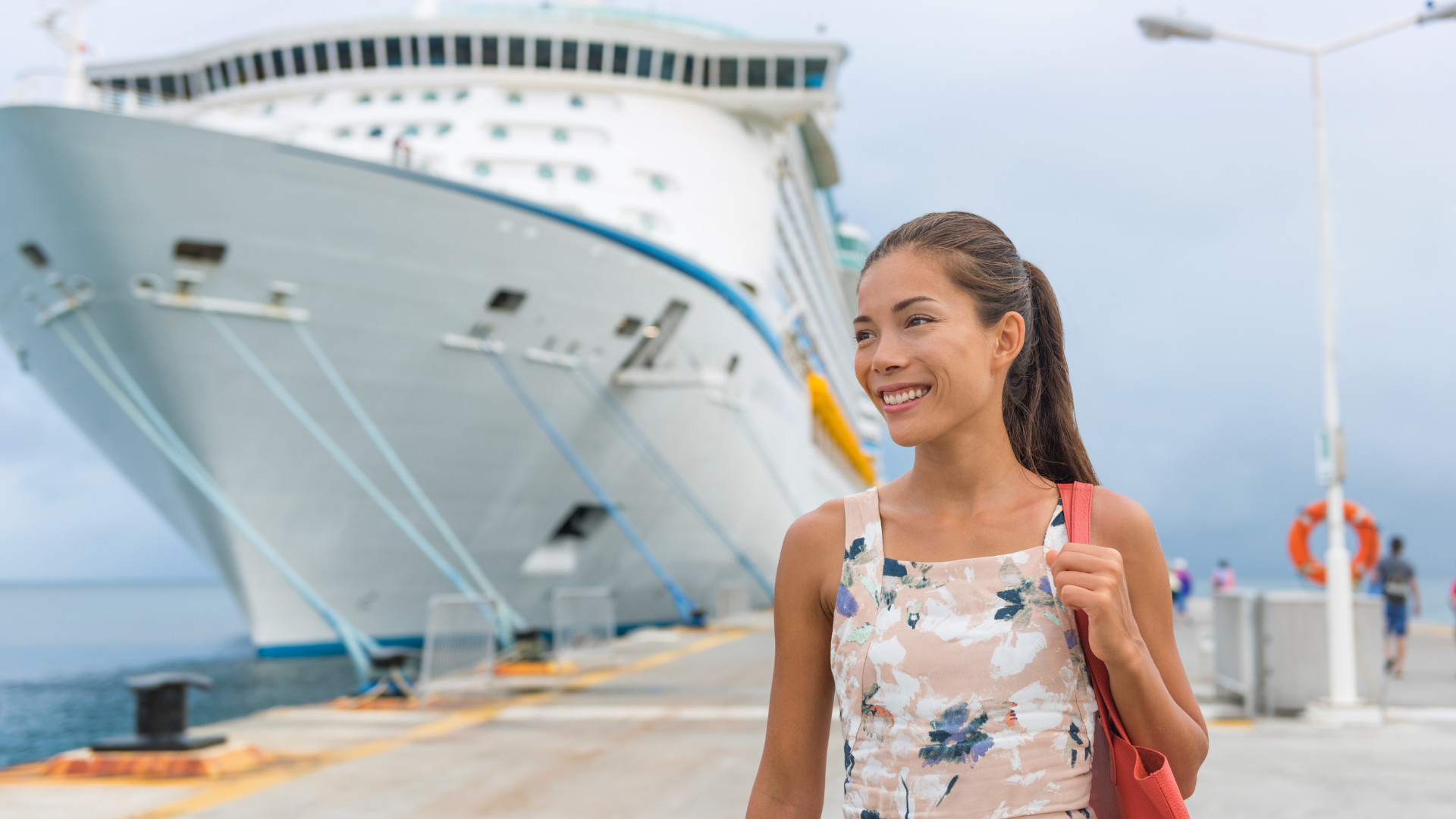 A passenger departing a cruise ship for the shore